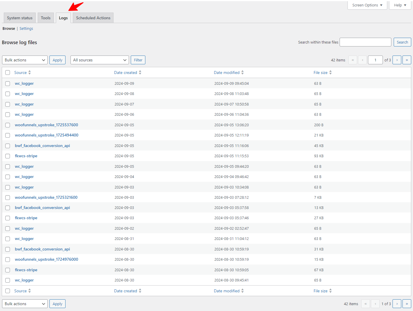 logs of woocommerce system status